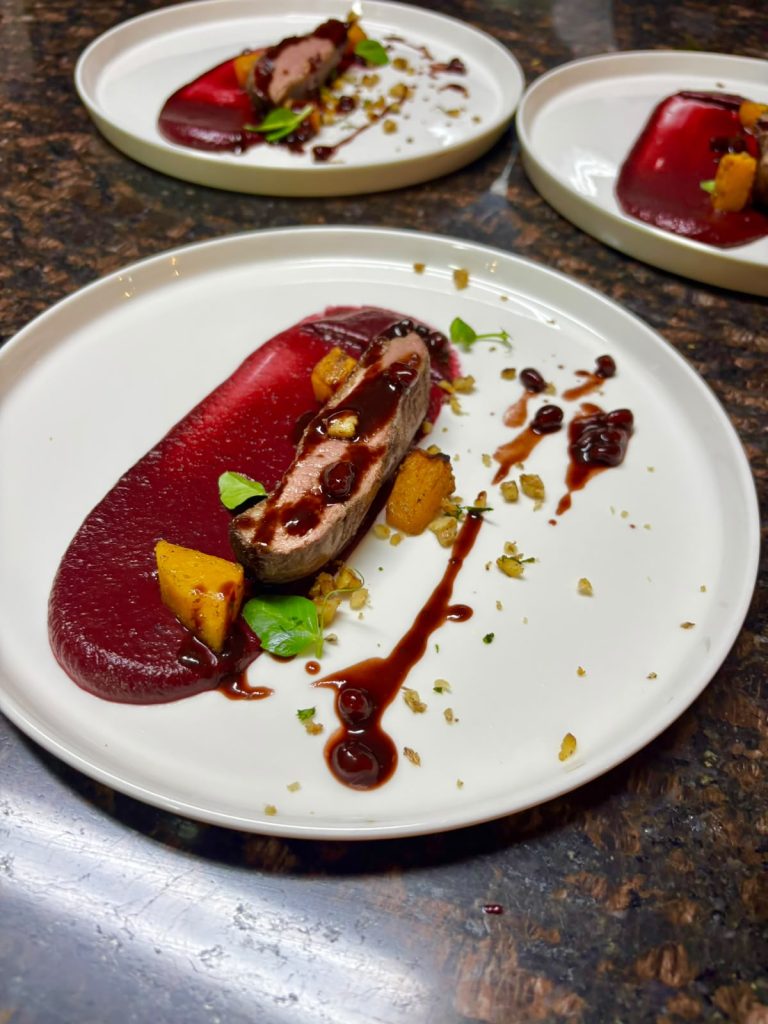 Duck breast with beetroot puree and glazed stone fruit