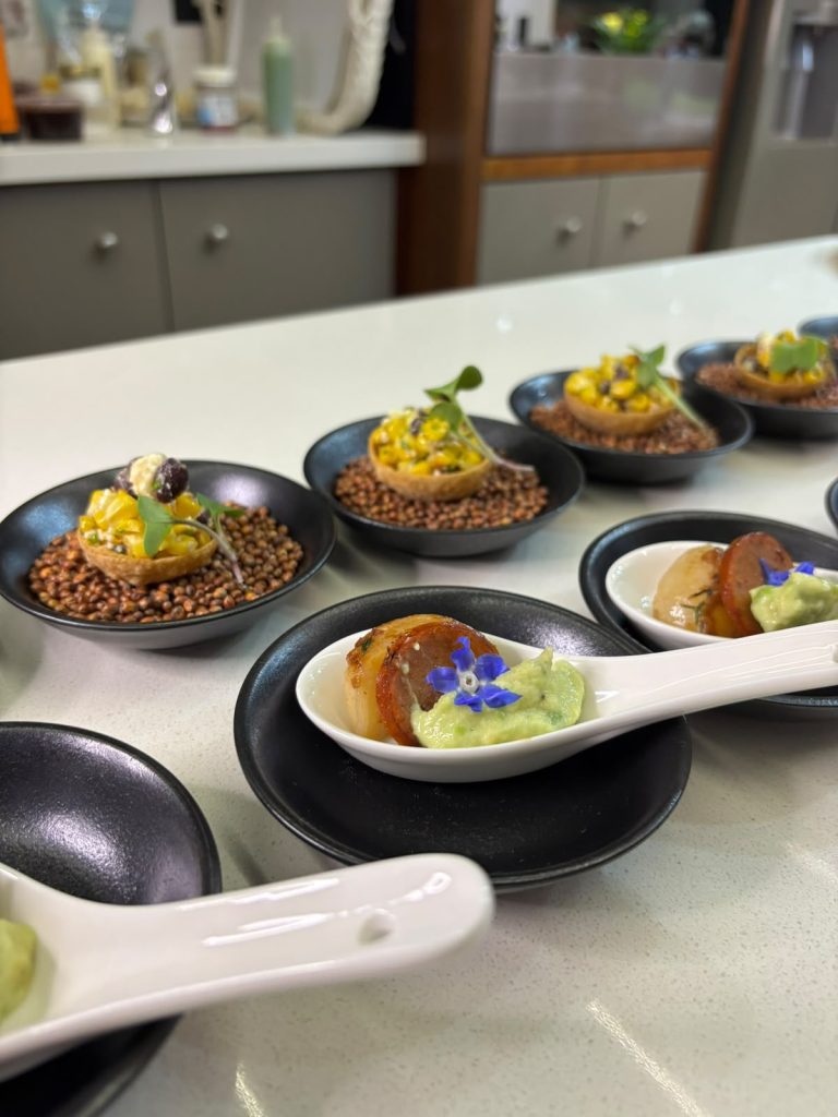 Canape tasting spoons and small bowls plated in the kitchen