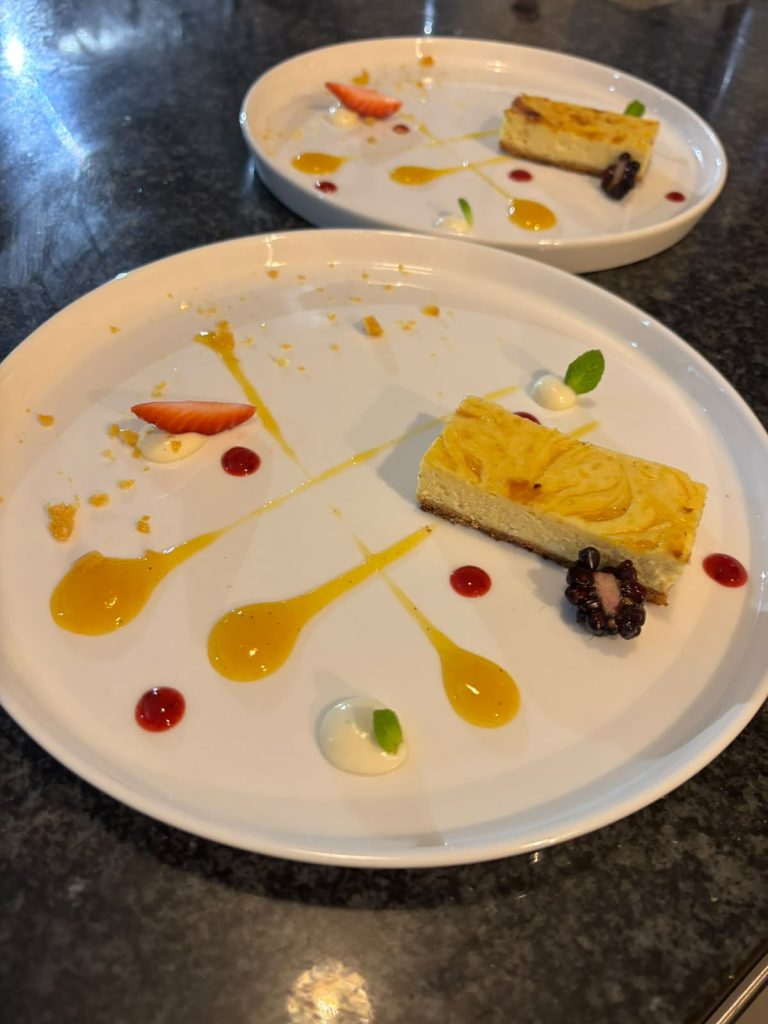 Mango cheesecake with berry compote and citrus gel
