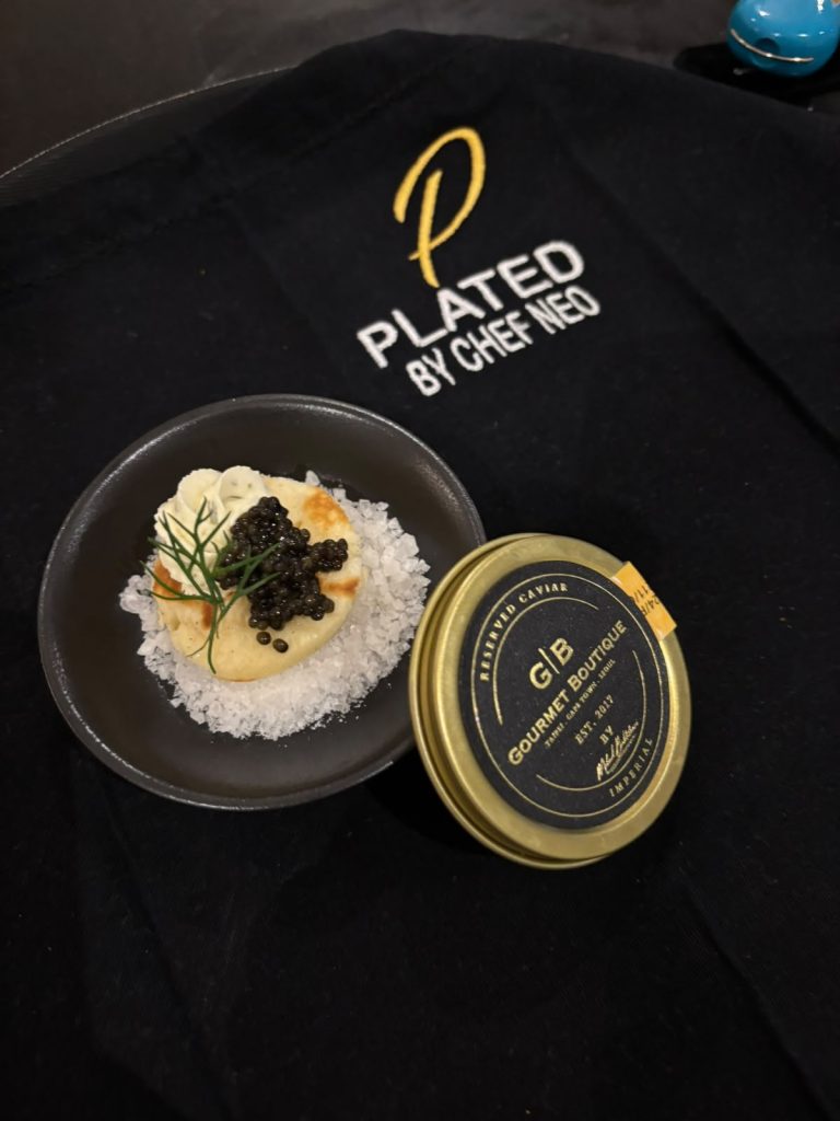 Caviar and blini canape on Plated by Chef Neo service linen
