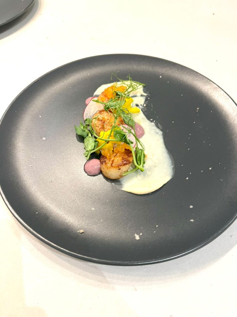 Shellfish starter with herb oil and micro greens